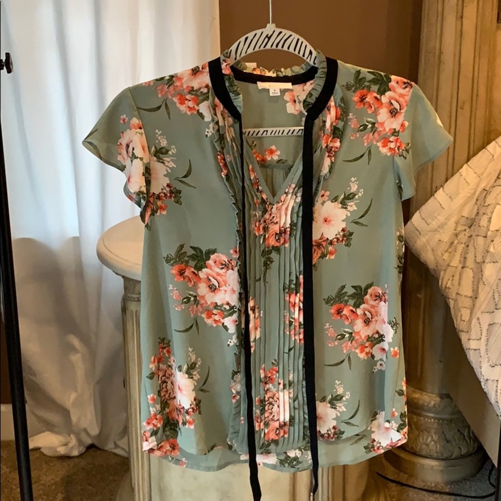 Green floral blouse